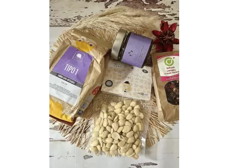 Tart with dark hazelnut cream and almonds, accompanied by an infusi...